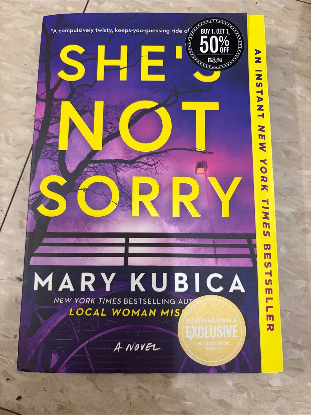 "She's Not Sorry" - Purple & Yellow Paperback